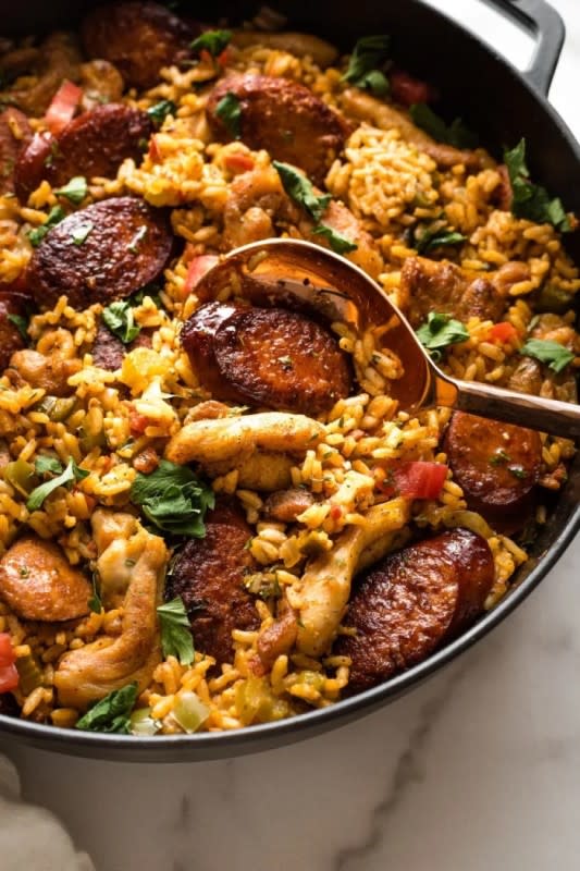 <p>Jocelyn Delk Adams</p><p>Filled with traditional spices, andouille sausage and so much Cajun flavor, you will swear you just stepped onto the streets of NOLA.</p><p><strong>Get the recipe: <a href="https://parade.com/1159946/jocelyndelkadams/andouille-and-blackened-chicken-jambalaya-skillet/" rel="nofollow noopener" target="_blank" data-ylk="slk:Andouille and Blackened Chicken Jambalaya Skillet;elm:context_link;itc:0;sec:content-canvas" class="link rapid-noclick-resp">Andouille and Blackened Chicken Jambalaya Skillet</a></strong></p>