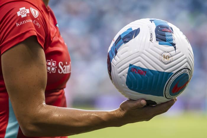 Kansas City Current midfielder Lo'eau LaBonta carries the National Women's Soccer League 10th-anniversary match ball on June 18, 2022, in Kansas City, Kansas.