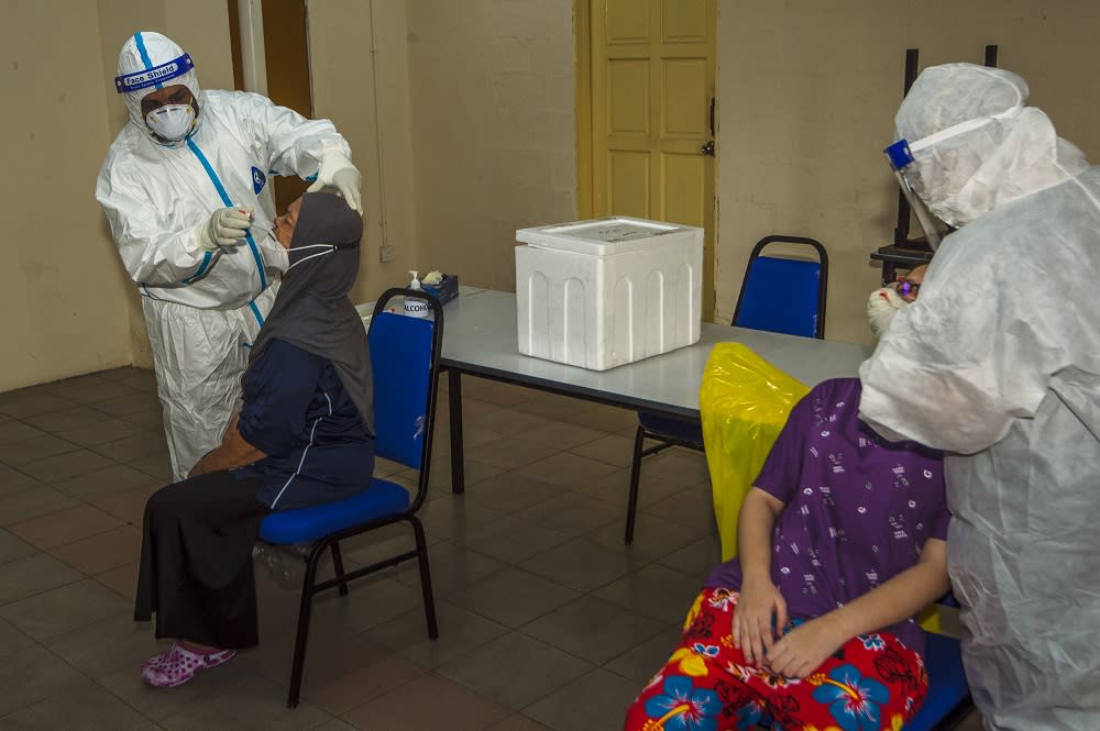 Health workers conduct a Covid-19 swab test in Bandar Tun Razak, Kuala Lumpur June 5, 2021. ― Picture by Shafwan Zaidon