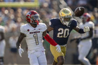 UNLV wide receiver Kyle Williams (1) looks at a ball that was overthrown under coverage by Notre Dame cornerback Benjamin Morrison (20) during the first quarter of an NCAA college football game, Saturday, Oct. 22, 2022, in South Bend, Ind. (AP Photo/Marc Lebryk)