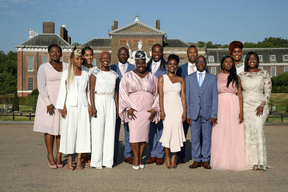 LONDON, ENGLAND - JULY 24:  The Kingdom Choir perform outside Kensington Palace on July 24, 2018 in London, England. The choir, which performed at the Royal Wedding of Prince Harry to Ms. Meghan Markle, announced that they have signed a record deal with Sony Music.  (Photo by Mike Marsland/Mike Marsland/WireImage)