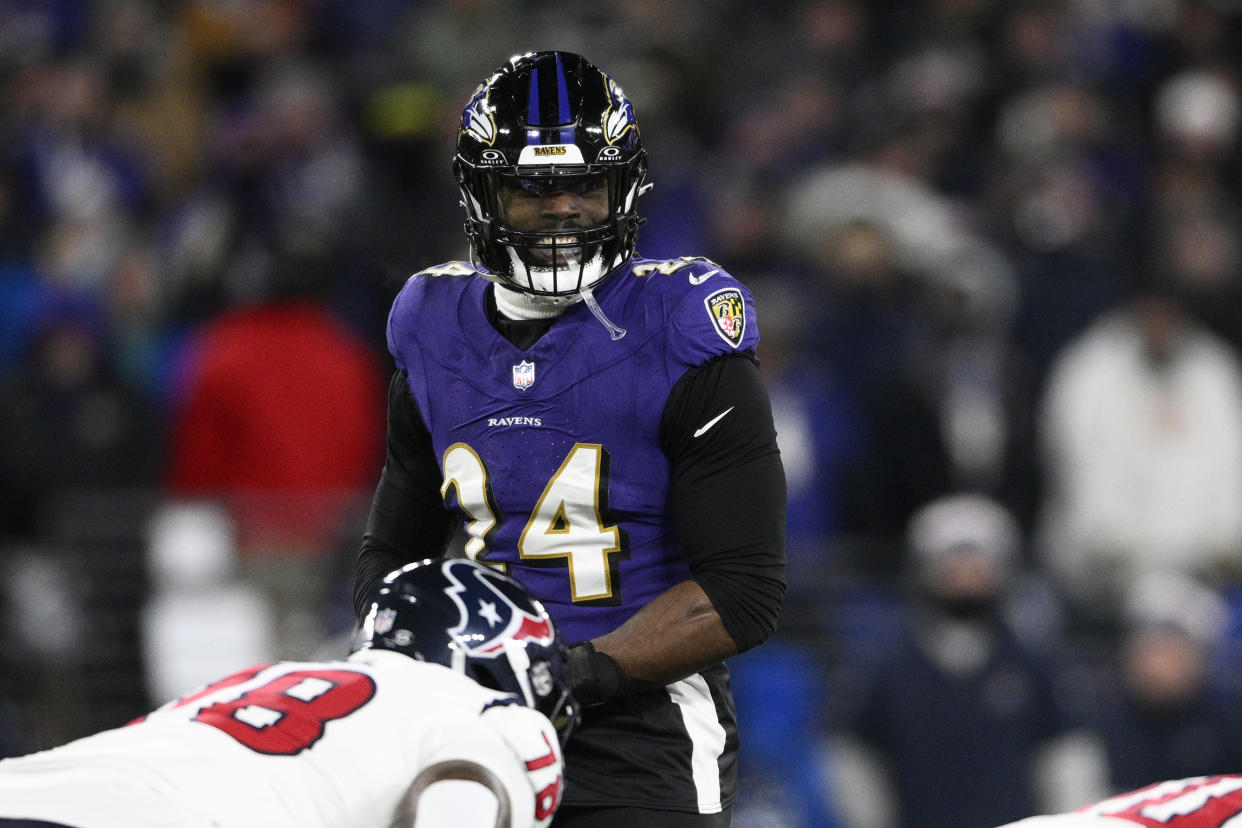 Baltimore Ravens linebacker Jadeveon Clowney (24) in action during the second half of an NFL football AFC divisional playoff game against the Houston Texans, Saturday, Jan. 20, 2024, in Baltimore. (AP Photo/Nick Wass)