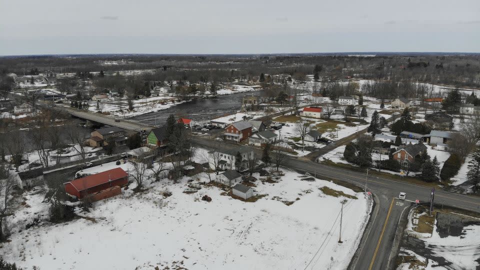 Cars travel along the main road and over the St. Regis River, left, through the reservation Mohawks call Akwesasne, Tuesday, March 15, 2022. (AP Photo/Seth Wenig) - Seth Wenig/AP/File