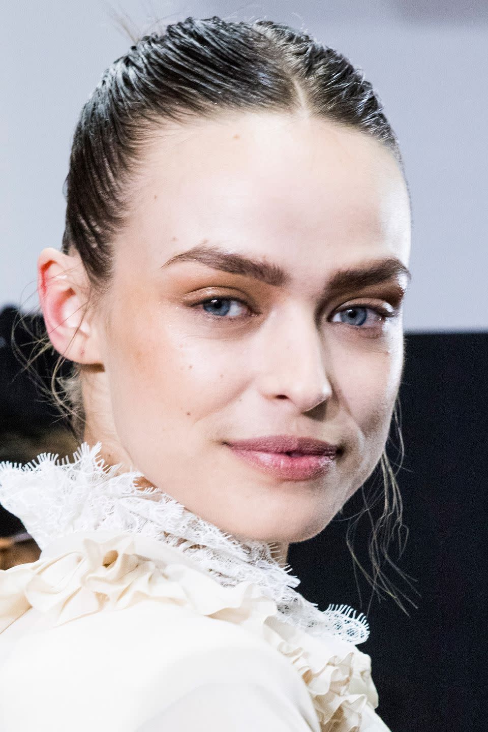 <p><strong>Trend: natural bronze</strong></p><p>Using natural bronzy tones, Tom Pecheux enhanced the natural beauty of the models with a sweep of colour (and highlighter) across their eyelids, cheeks and lips, alongside bold, brushed-up brows. </p>