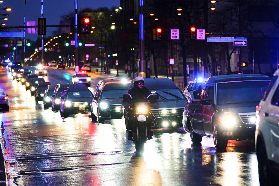 The funeral procession for the victims of a deadly row house fire arrive for services at Temple University in Philadelphia, Monday, Jan. 17, 2022. Officials say it's the city's deadliest single fire in at least a century. (AP Photo/Matt Rourke)