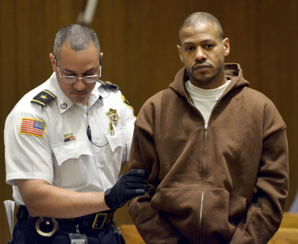 Stewart Weldon is led into Springfield District Court for arraignment on a new charge of kidnapping on Monday. Source: Don Treeger/The Republican via AP