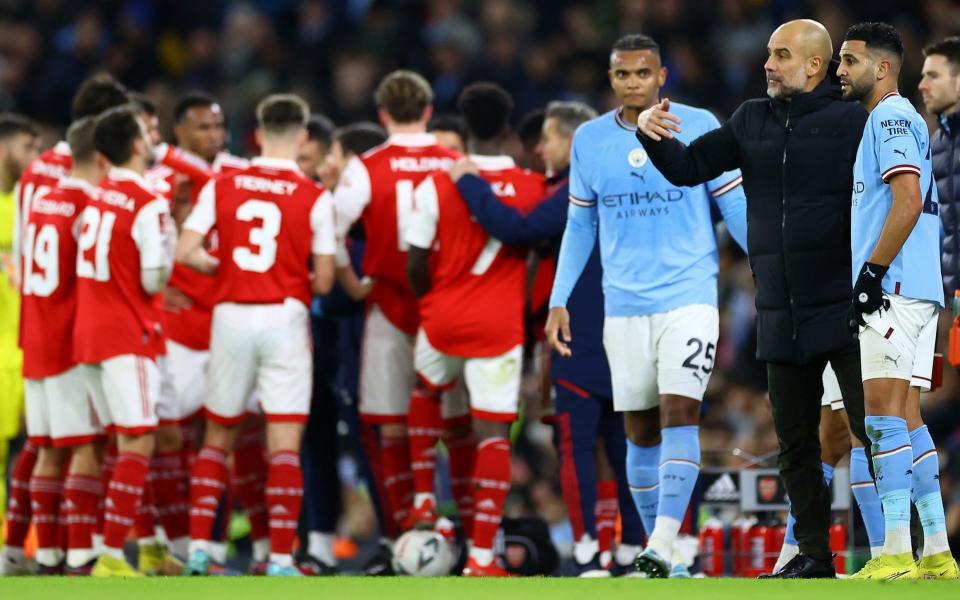  Pep Guardiola issues instructions to Riyad Mahrez - Title race predictions: A five-point lead with a game in hand – will Arsenal win the Premier League? - Getty Images/Michael Steele