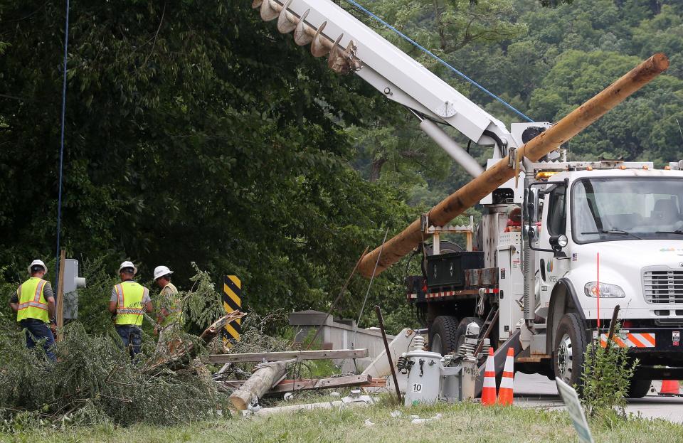 NYSEG crews work to replace a pole and transformer along Route 22 in North Salem as cleanup from Tropical Storm Isaias continues Aug. 7, 2020.  