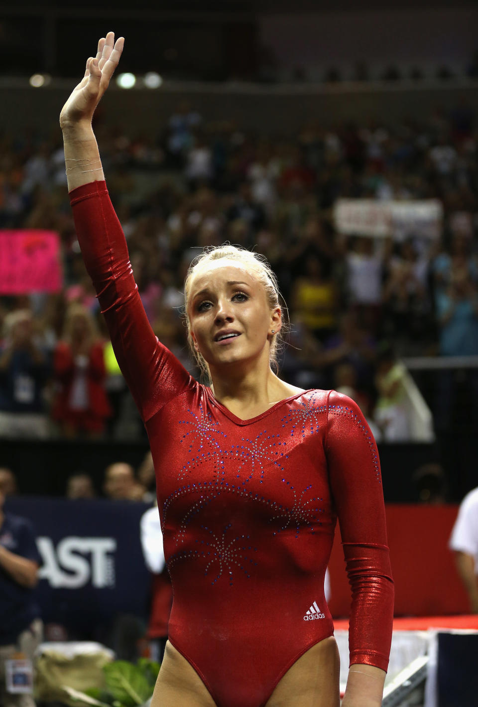 <b>Bowing out</b><br><br>Olympic gold medalist Nastia Liukin tearfully waves to the crowd after competing at the 2012 U.S. Olympic Gymnastics Team Trials on July 1, 2012. Liukin fell hard during her uneven bars routine, essentially putting an end to her hopes of going to London. However, like a true champion, Liukin returned to the bars to complete her performance before graciously saying goodbye to her adoring fans. (Photo by Ezra Shaw/Getty Images)