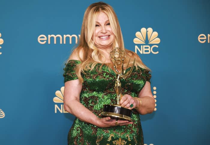 A closeup of Jennifer holding her award