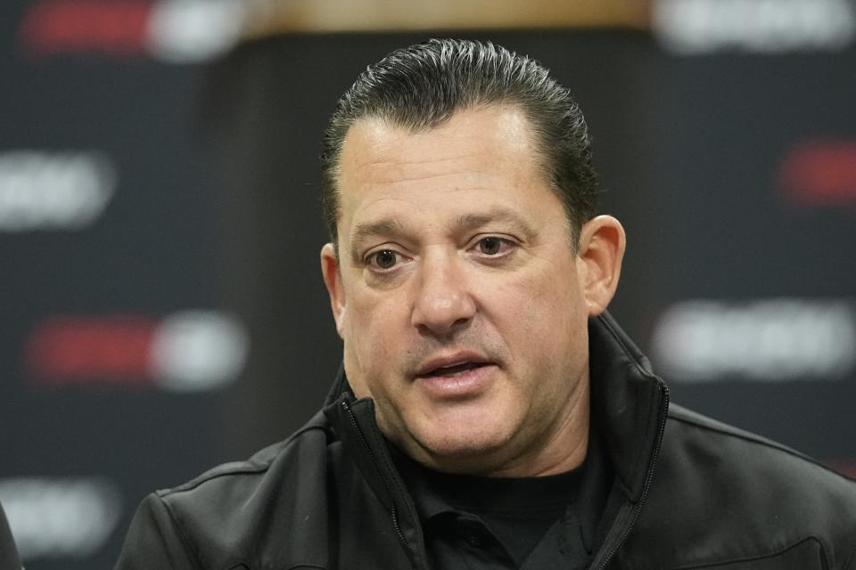 Tony Stewart speaks during a news conference, Thursday, Dec. 7, 2023, in Indianapolis. Stewart's wife, Leah Pruett, will step away from the NHRA drag racing series in 2024 to focus on starting a family with Stewart. Her NASCAR Hall of Famer husband will replace her next season in the Top Fuel dragster. (AP Photo/Darron Cummings)