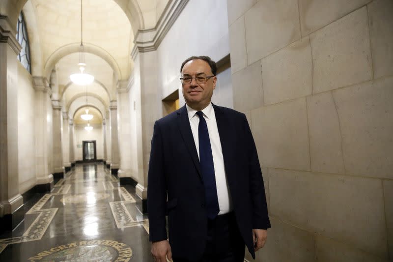 FILE PHOTO: Bank of England Governor Andrew Bailey poses for a photograph on the first day of his new role at the Central Bank in London