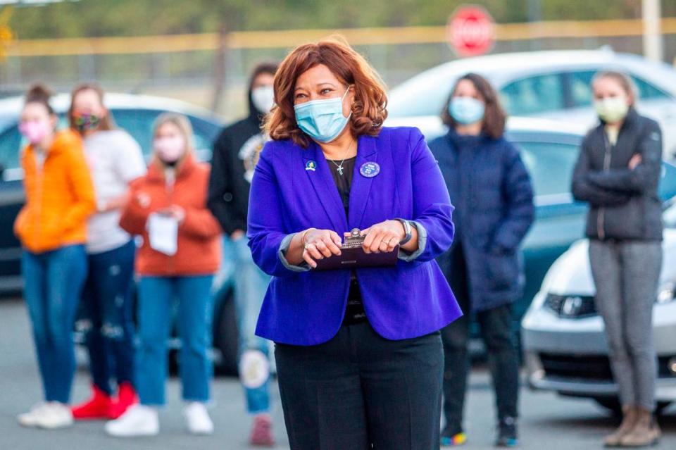 Erica Smith listens to speakers during her 2022 U.S Senate campaign launch event Saturday, March 8, 2021 at Hillside High School in Durham. Smith is running on an unabashedly progressive platform, embracing Medicare for All, universal basic income, the Green New Deal and canceling all student loan debt.