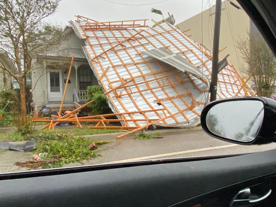 The roof of a house on Alcaniz Street has blown off after Hurricane Sally swept through the area on Sept. 16, 2020.