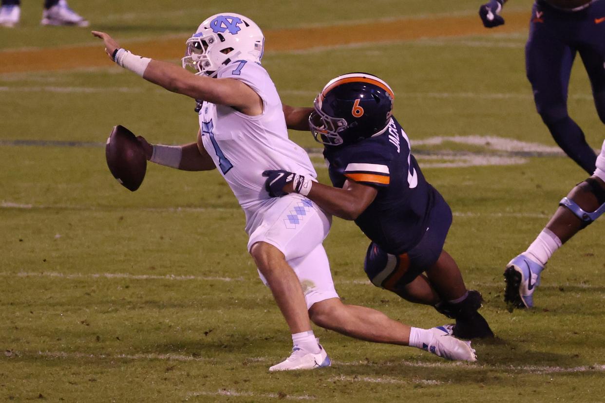 Virginia linebacker Nick Jackson (6) has signed multiple NIL deals, including one with Rhoback.