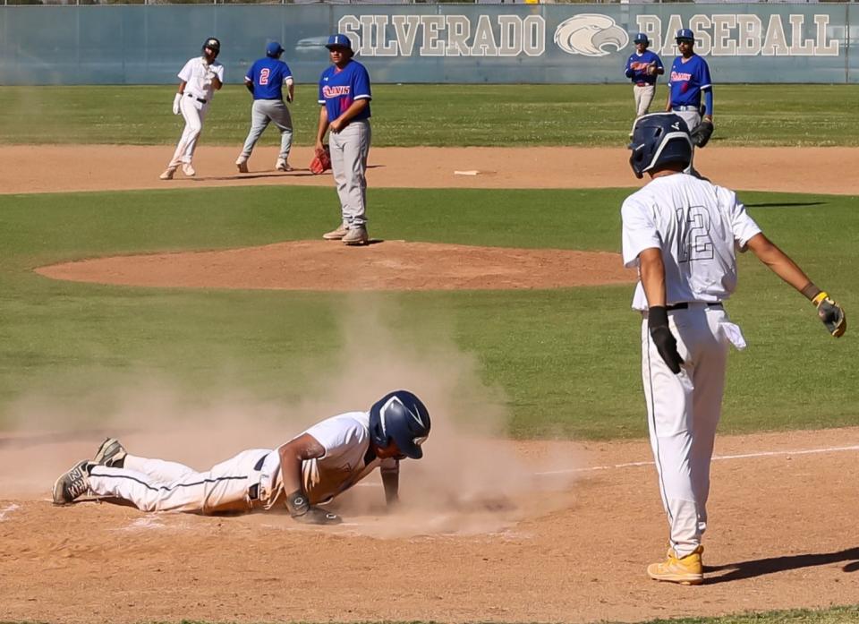 Silverado's Brandon Chavez slides in safely to home during the game against Indio in the first round of the CIF-Southern Section Division 7 baseball playoffs on Friday, May 3, 2024.