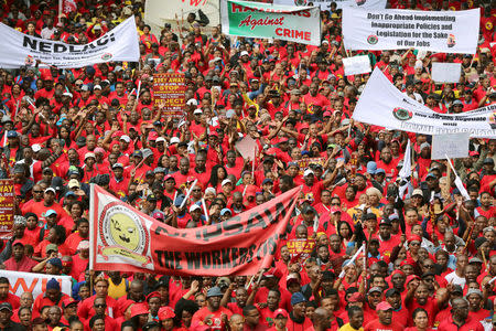 South African union members march during a nationwide protest against a proposed minimum wage in Cape Town, South Africa, April 25, 2018. REUTERS/Sumaya Hisham