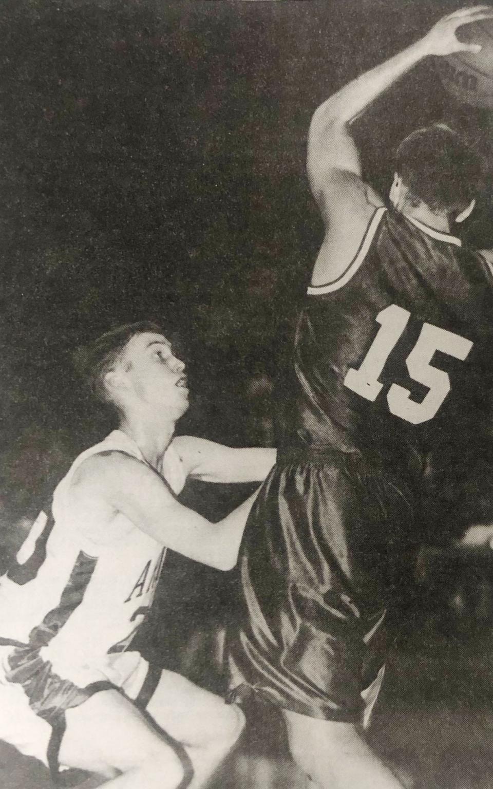 Watertown's Justin Struckman guards Aberdeen Central's Josh Heupel during a 1994-95 season high school boys basketball game in the Watertown Civic Arena. Heupel is now the head football coach at the University of Tennessee.