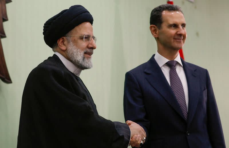 Syria's President Bashar al-Assad meets with Iranian President Ebrahim Raisi in Damascus
