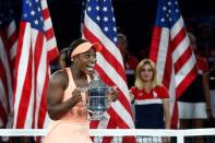 Tennis - US Open - Womens Final - New York, U.S. - September 9, 2017 - Sloane Stephens of the United States reacts with the trophy after defeating Madison Keys of the United States. REUTERS/Mike Segar