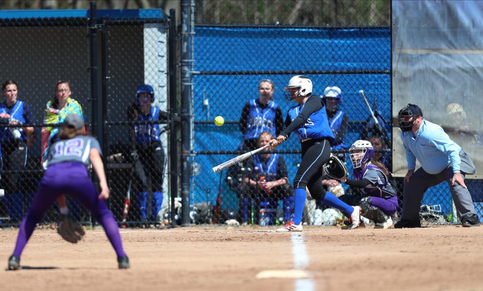 Pearl River's Riley Moroney (18) connects with a pitch during their 12-1 win over Clarkstown North in softball action at Pearl River High School in Pearl River on Wednesday, April 20, 2022.