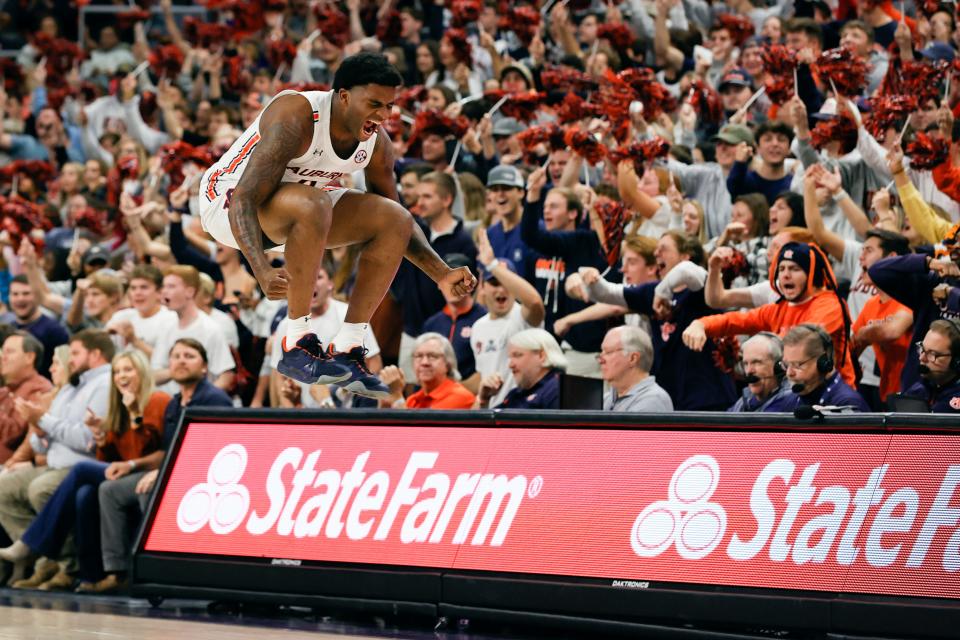 Auburn guard K.D. Johnson (0) reacts after a turnover by Central Florida during the first half of an NCAA college basketball game Wednesday, Dec. 1, 2021, in Auburn, Ala. (AP Photo/Butch Dill)