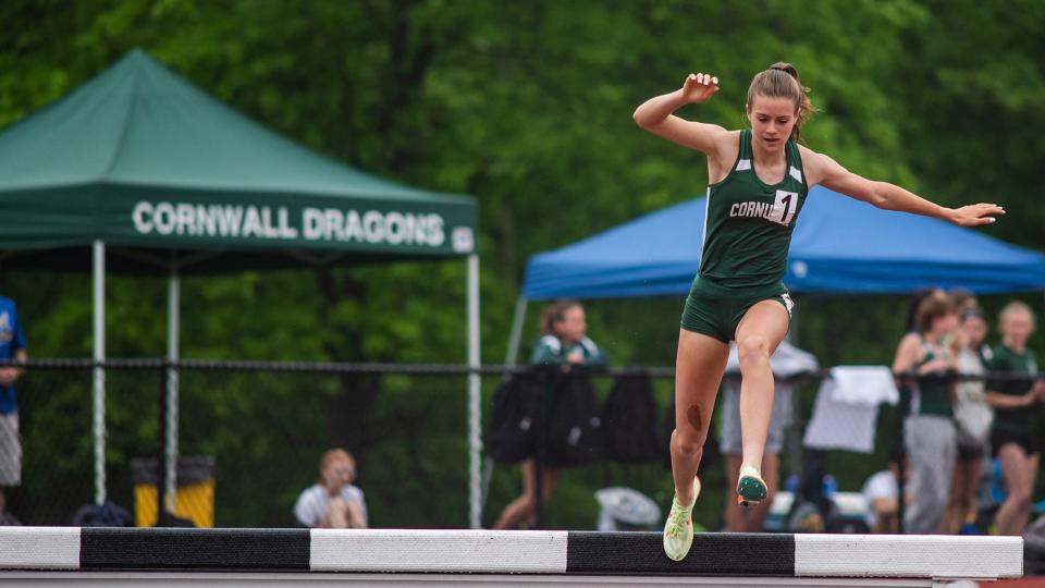 Cornwall's Karrie Baloga competes in the girls steeplecase race during the OCIAA track and field championship meet at Goshen High School  on Saturday, May 21, 2022. Baloga won the race.