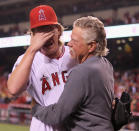 ANAHEIM, CA - MAY 02: Starting pitcher Jered Weaver #36 of the Los Angeles Angels of Anaheim celebrates with his dad Dave after throwing a no-hitter against the Minnesota Twins at Angel Stadium of Anaheim on May 2, 2012 in Anaheim, California. The Angels defeated the Twins 9-0. (Photo by Jeff Gross/Getty Images)