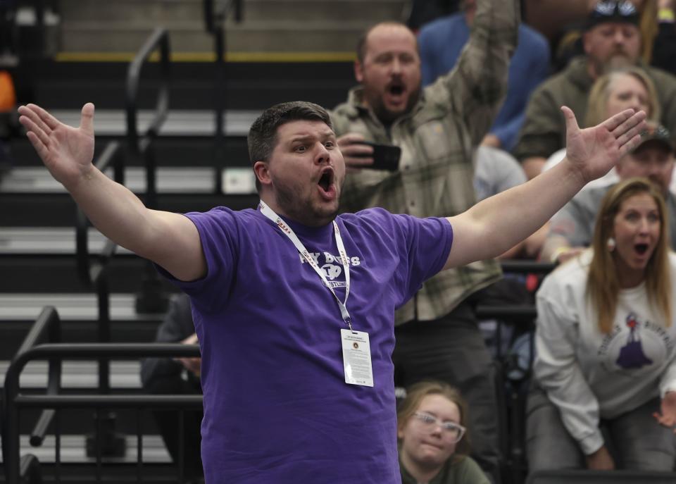 Tooele’s coach Joel Spendlove cheers after Anna Chlarson wins her match at the 4A State Championships at Utah Valley University in Orem on Wednesday, Feb. 14, 2024. | Laura Seitz, Deseret News