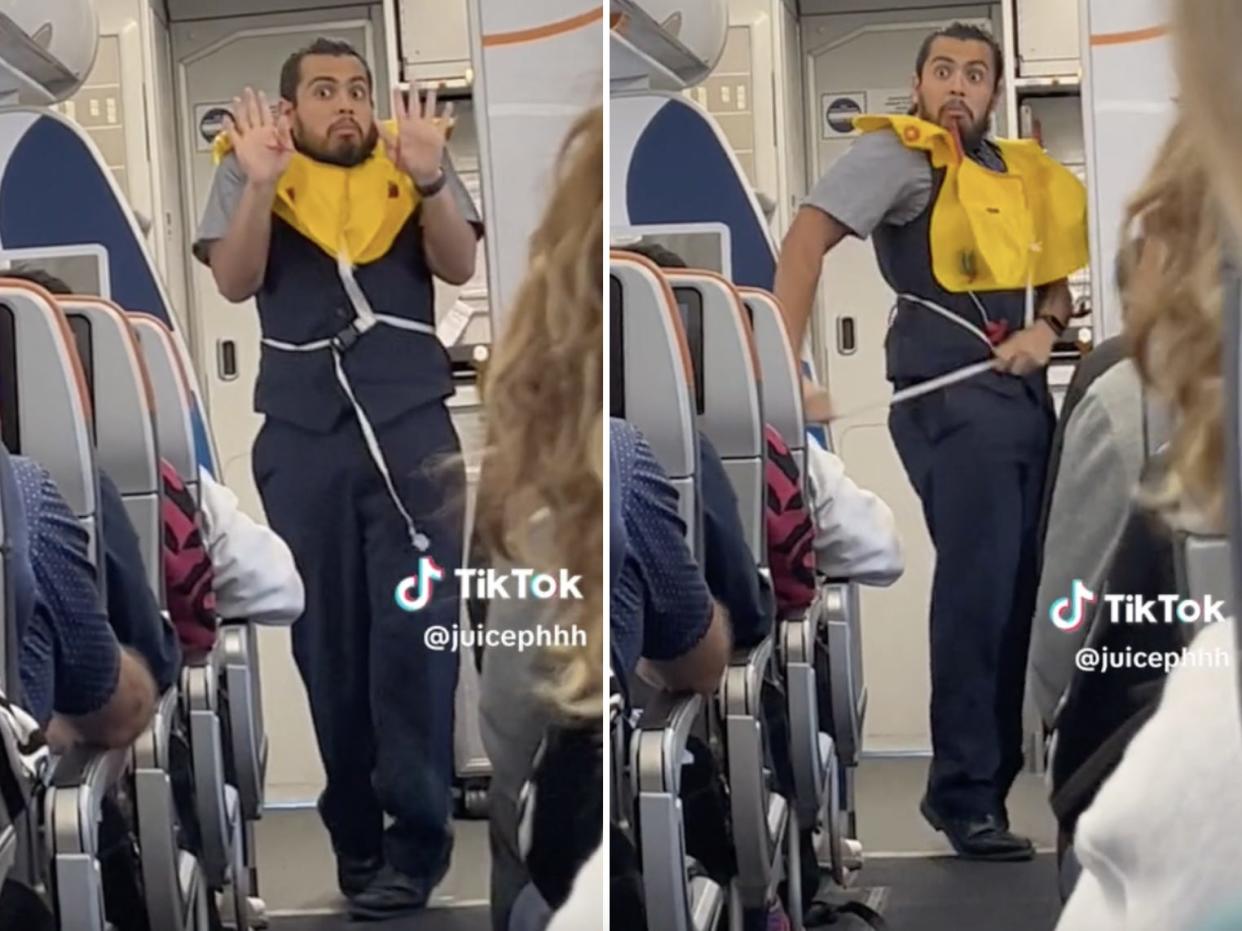 Flight attendant makes animated faces and gestures while doing a safety vest demo.