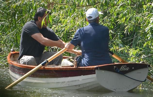 George Clooney took some time out from his daddy duties to relax on a river with a friend. Source: Diimex