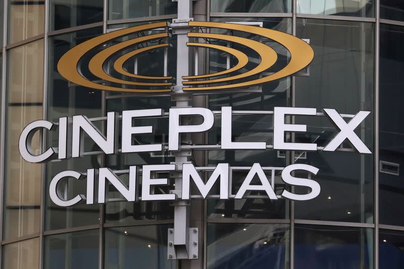 FILE PHOTO: A Cineplex movie theatre sign looms over Yonge street in Toronto