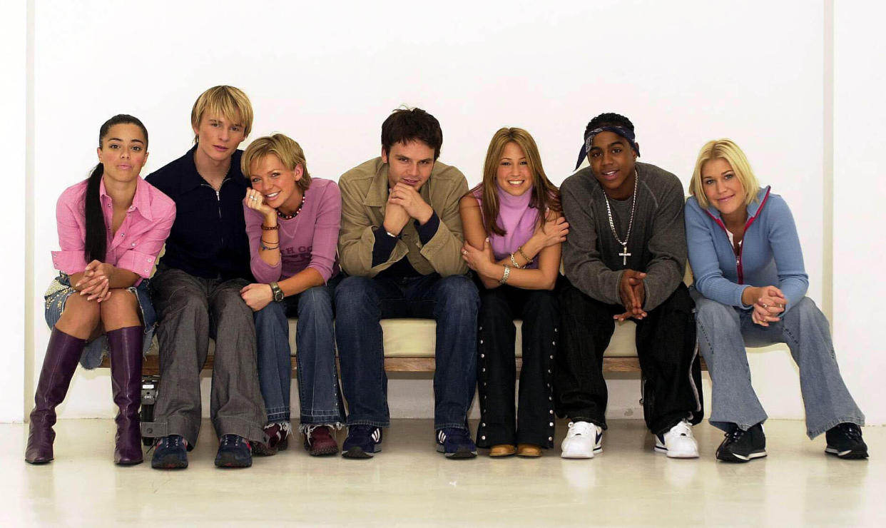 Pop group S Club 7 Tina Barrett, John Lee, Hannah Spearritt, Paul Cattermole, Rachel Stevens, Bradley McIntosh and Jo O'Meara. *27/03/02 Pop group S Club 7 (L-R) Tina Barrett, John Lee, Hannah Spearritt, Paul Cattermole, Rachel Stevens, Bradley McIntosh and Jo O'Meara. S Club 7 star Paul Cattermole announced Wednesday 27 March 2002, he was quitting for a solo career - but the band are to carry on. His departure came as the rest of the band resigned their deal with both their