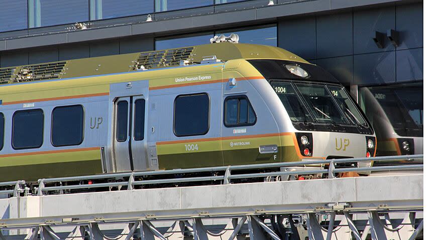 UP Express is a rail link that connects Union Station to Pearson Airport and that stops at Bloor, Weston and Pearson stations.  (Mike Cole/CBC - image credit)