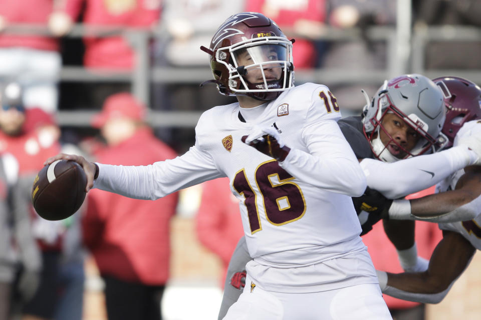 Arizona State quarterback Trenton Bourguet throws a pass during the first half of an NCAA college football game against Washington State, Saturday, Nov. 12, 2022, in Pullman, Wash. (AP Photo/Young Kwak)