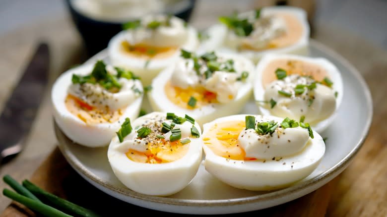 Deviled eggs on white plate