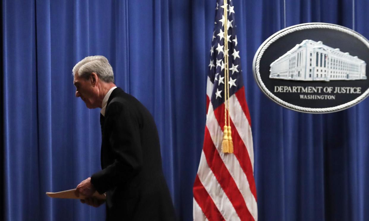 <span>Special counsel Robert Mueller leaves the podium after speaking about the Russia investigation in May 2019.</span><span>Photograph: Carolyn Kaster/AP</span>