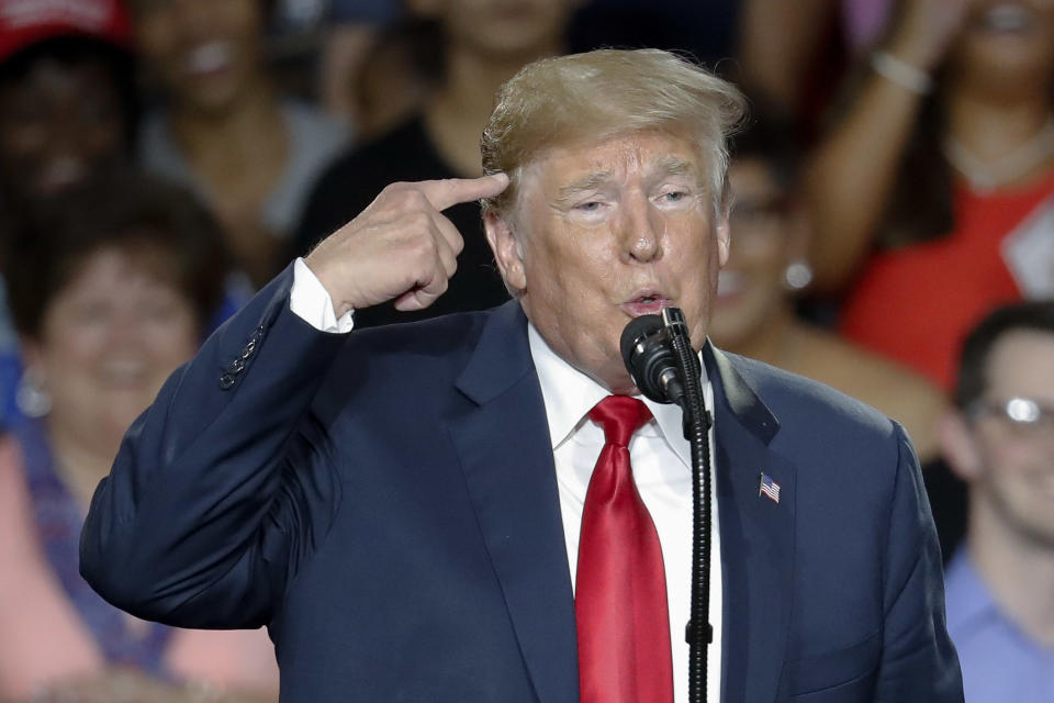 President Donald Trump speaks during a rally, Saturday, Aug. 4, 2018, in Lewis Center, Ohio. (AP Photo/John Minchillo)