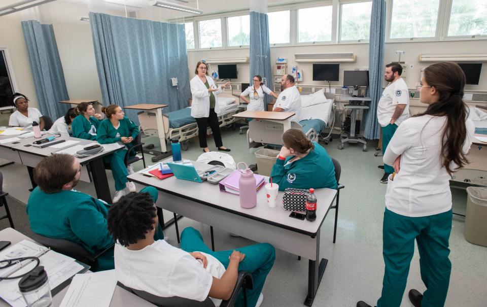 Instructor Teri Smits, top center, teaches an Into To Nursing class at the Pensacola State College - Warrington Campus on Thursday, Jan. 19, 2023.