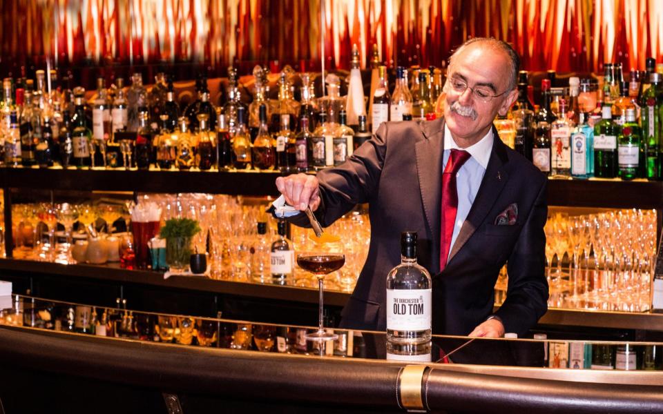 Giuliano Morandin mixing a cocktail at The Dorchester's bar