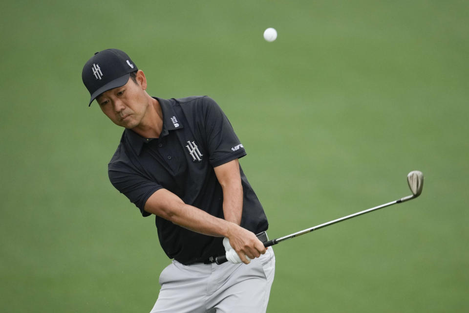 Kevin Na chips to the green on the second hole during the first round of the Masters golf tournament at Augusta National Golf Club on Thursday, April 6, 2023, in Augusta, Ga. (AP Photo/Matt Slocum)
