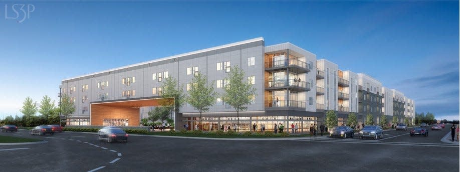 A rendering of a 298-unit apartment complex proposed for the site of a former Wilmington Honda dealership.