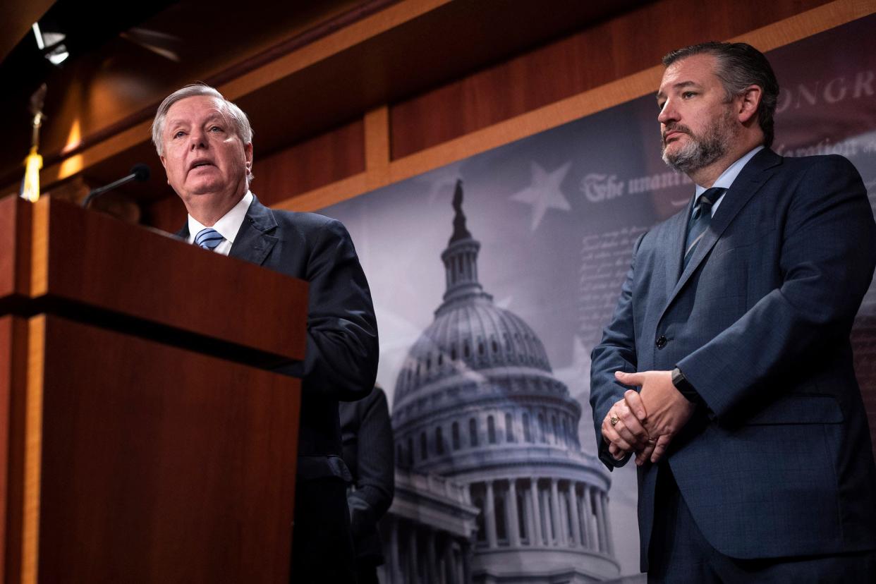 Republican Sens. Lindsey Graham of South Carolina (L) and Ted Cruz of Texas (R) speak to reporters during a press conference about the confirmation vote for Supreme Court nominee Ketanji Brown Jackson at the US Capitol on April 7, 2022 in Washington, DC.