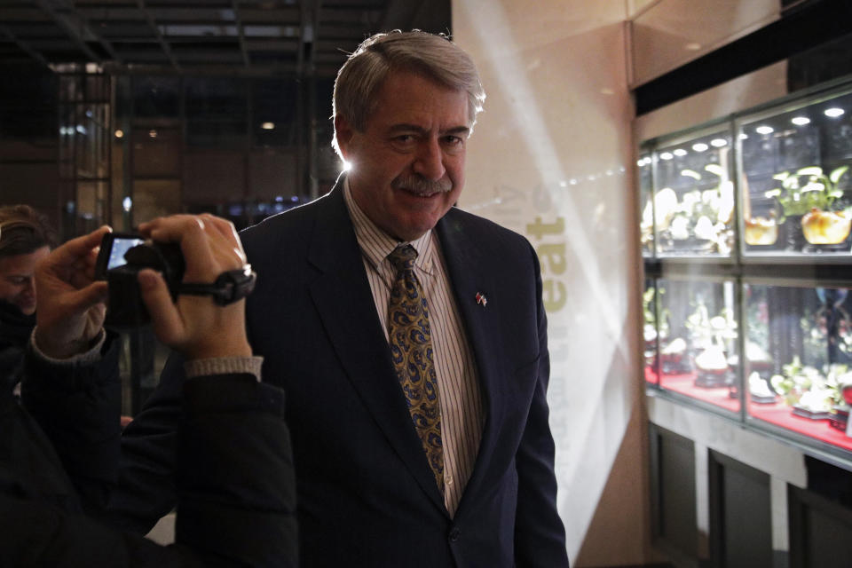 U.S. Undersecretary for Trade and Foreign Agricultural Affairs Ted McKinney walks into a hotel after a second day of meetings with Chinese officials in Beijing, Tuesday, Jan. 8, 2019. An official Chinese newspaper warned Washington not to demand too much from Beijing as talks on ending their tariff war wound up a second day Tuesday with no word on possible progress. (AP Photo/Andy Wong)