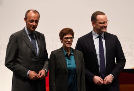 Christian Democratic Union (CDU) candidates Friedrich Merz, Annegret Kramp-Karrenbauer and Jens Spahn arrive at a regional conference in Luebeck, Germany, November 15, 2018. REUTERS/Fabian Bimmer