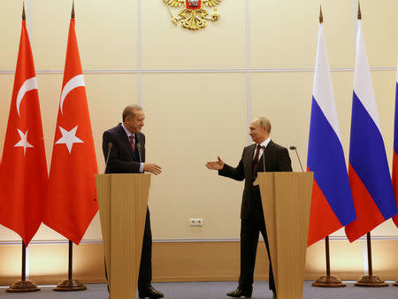 Turkish President Tayyip Erdogan and his Russian counterpart Vladimir Putin attend a news conference in Sochi, Russia, November 13, 2017. Yasin Bulbul/Presidential Palace/Handout via REUTERS