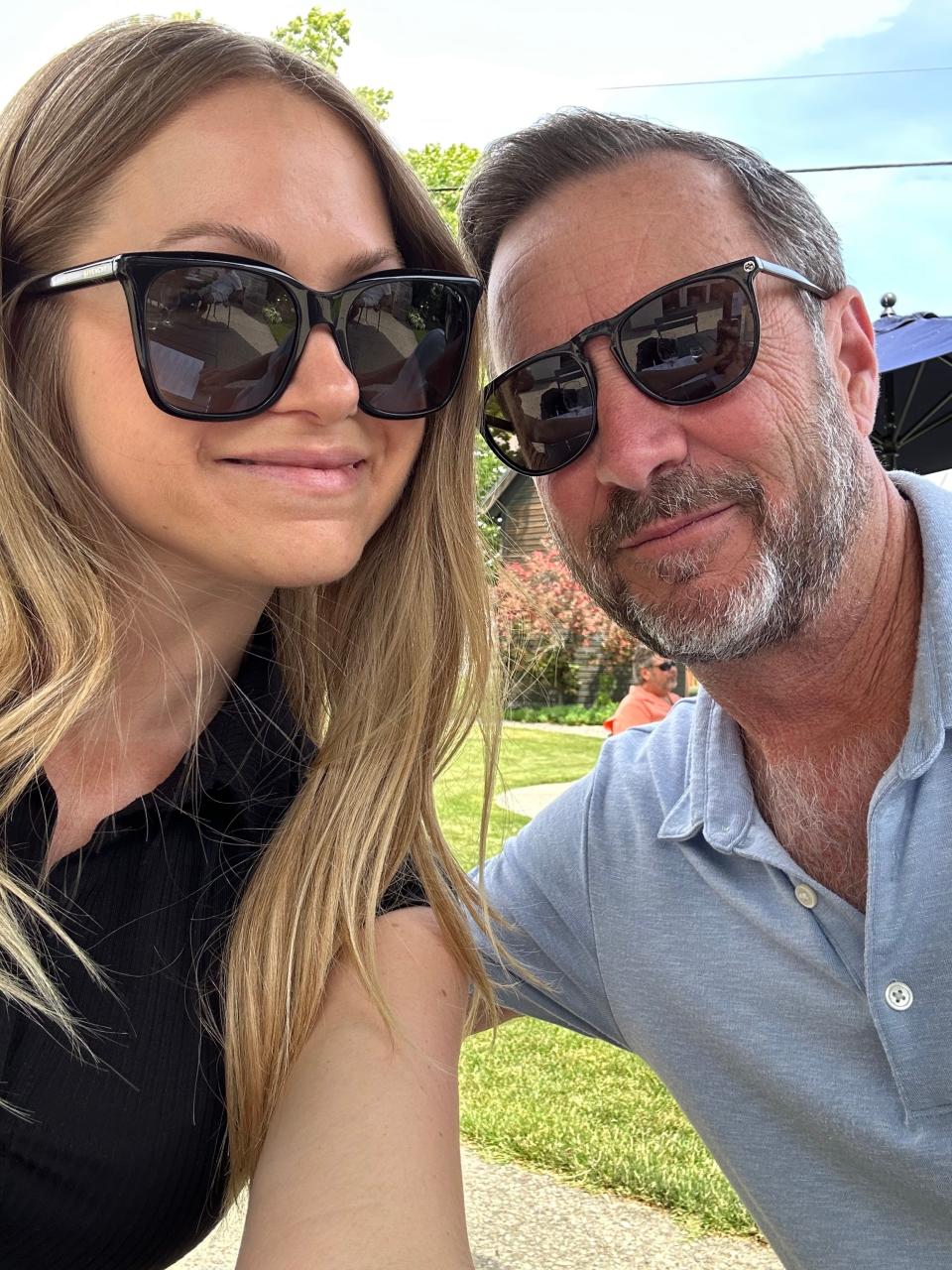 Melissa Persling and her ex-boyfriend, Jim, outside wearing sunglasses while on vacation together