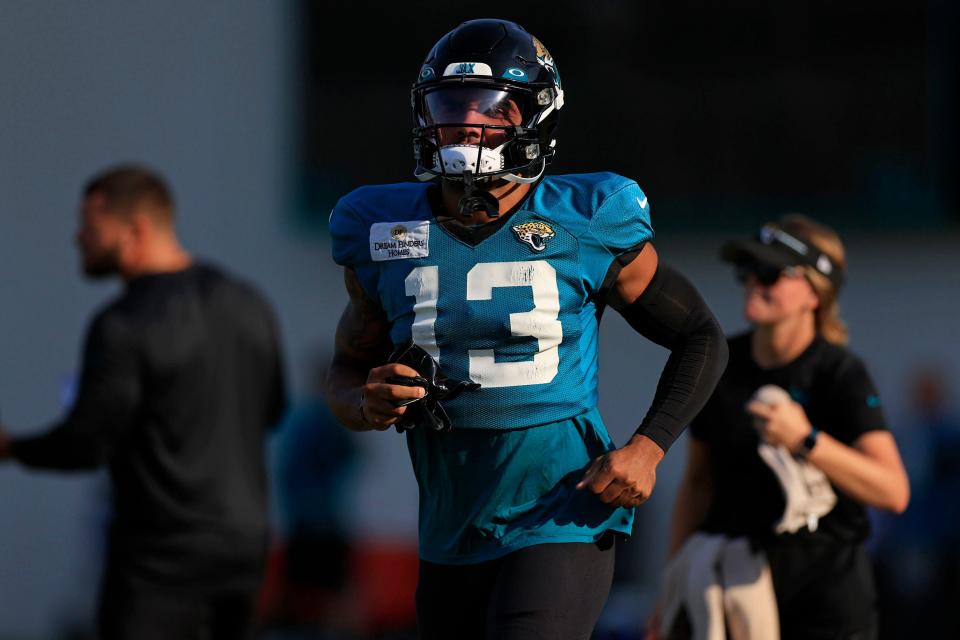 Jacksonville Jaguars wide receiver Christian Kirk (13) warms up Tuesday, Aug. 1, 2023 at Miller Electric Center at EverBank Stadium in Jacksonville, Fla. Today marked the first padded practice. 