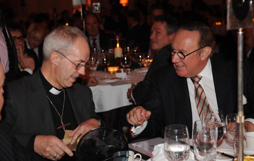 Bishop Welby chats with Andrew Neil after collecting his award for Peer of the Year at this year's Spectator Magazine's Parliamentarian of the Year Awards, in central London.