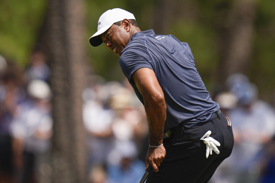 Tiger Woods reacts after missing a putt on the seventh hole during the second round of the U.S. Open golf tournament Friday, June 14, 2024, in Pinehurst, N.C. (AP Photo/Frank Franklin II )